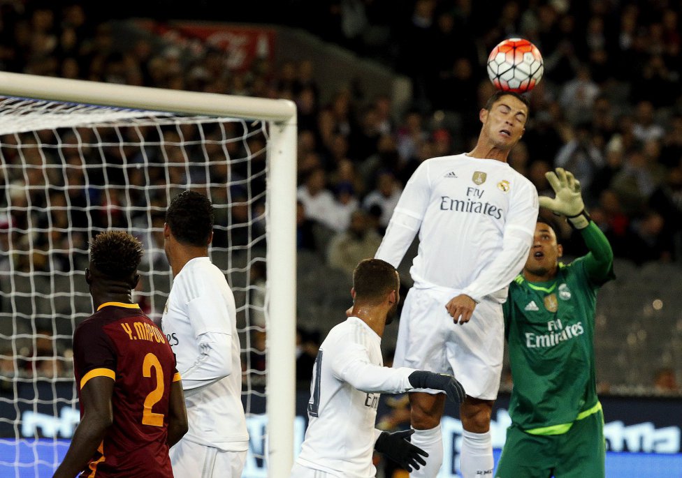 Real Madrid's Cristiano Ronaldo heads the ball during the International Champions Cup soccer match against AS Roma at the Melbourne Cricket Ground, Australia