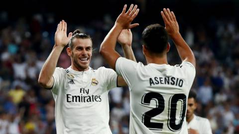Bale y Asensio celebran el segundo gol del Madrid.